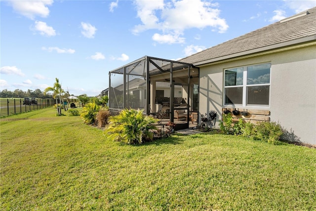 view of yard with a lanai