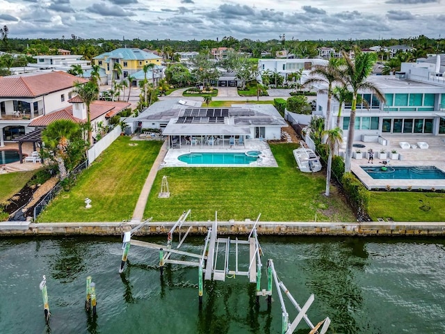 drone / aerial view with a water view