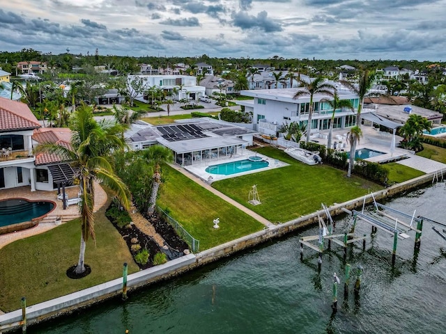 drone / aerial view featuring a water view