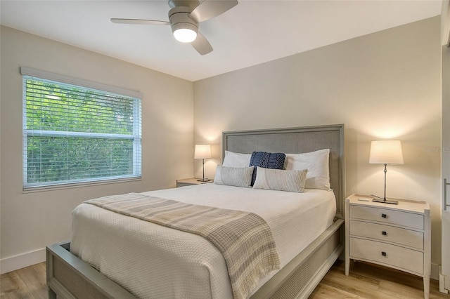 bedroom featuring ceiling fan and light wood-type flooring