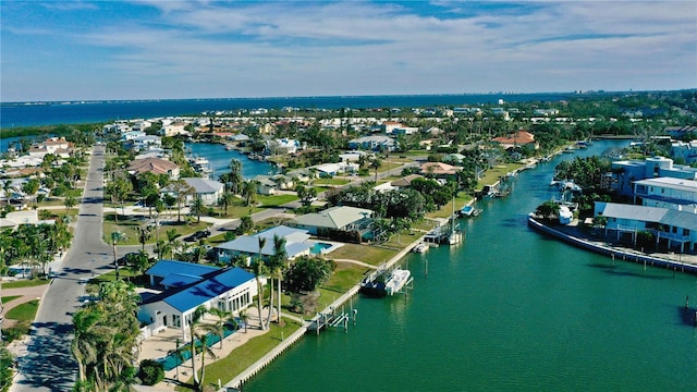 aerial view with a water view and a residential view