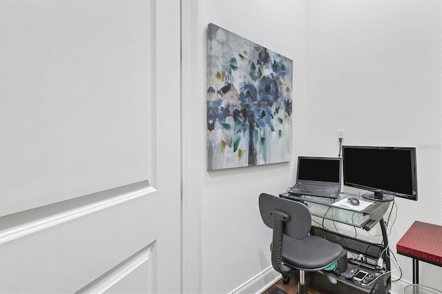 home office featuring hardwood / wood-style floors