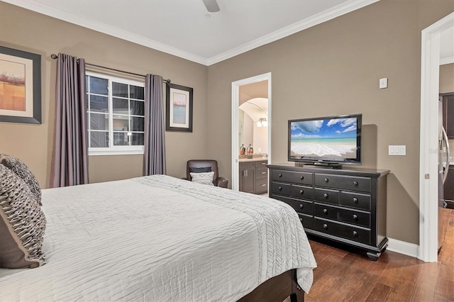 bedroom featuring ensuite bath, ceiling fan, crown molding, and dark hardwood / wood-style flooring