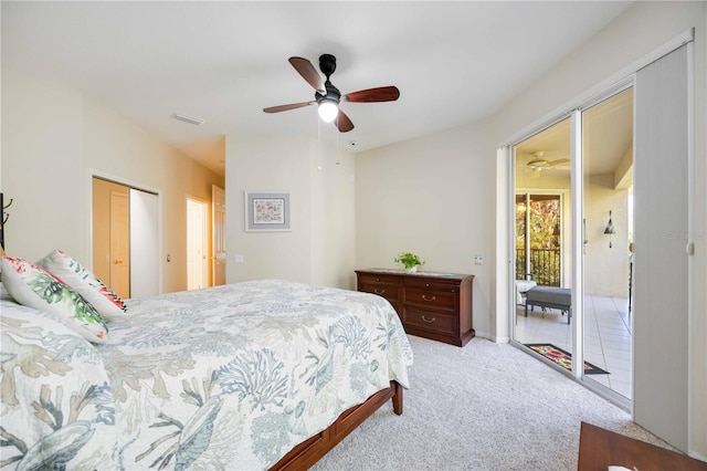 bedroom with ceiling fan, access to exterior, and light carpet