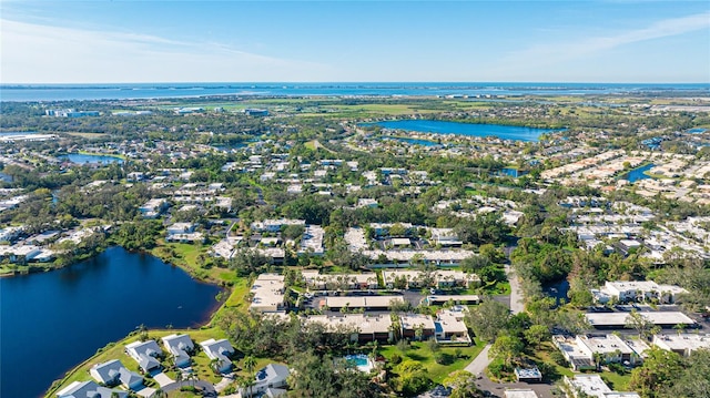 drone / aerial view with a water view