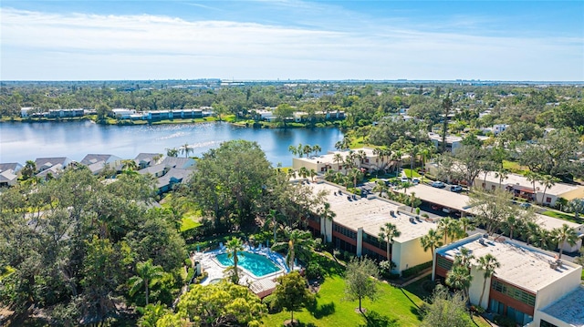 birds eye view of property featuring a water view