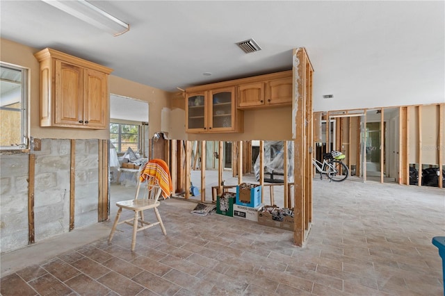 kitchen featuring light brown cabinetry