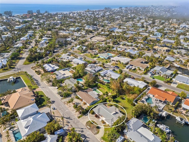 drone / aerial view with a water view