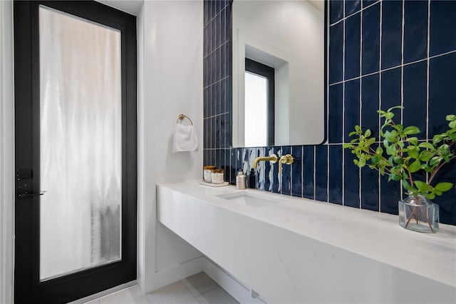 bathroom with vanity and tile patterned flooring