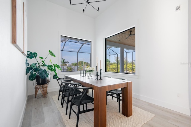 dining space with light wood-type flooring