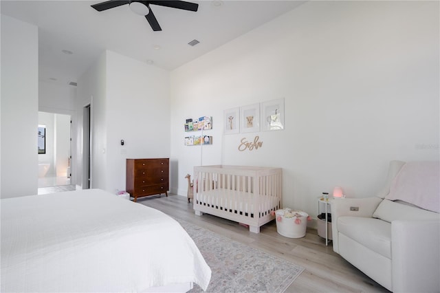 bedroom featuring ceiling fan and light hardwood / wood-style floors