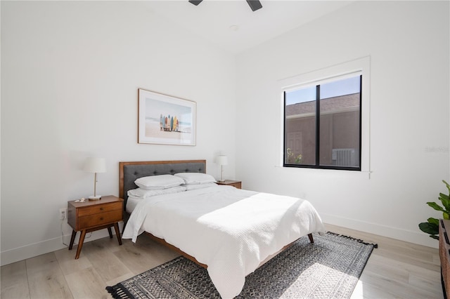 bedroom featuring ceiling fan and light hardwood / wood-style flooring