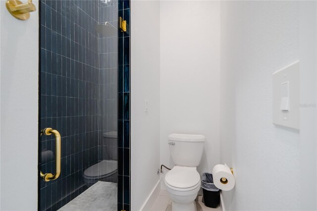 bathroom with walk in shower and toilet