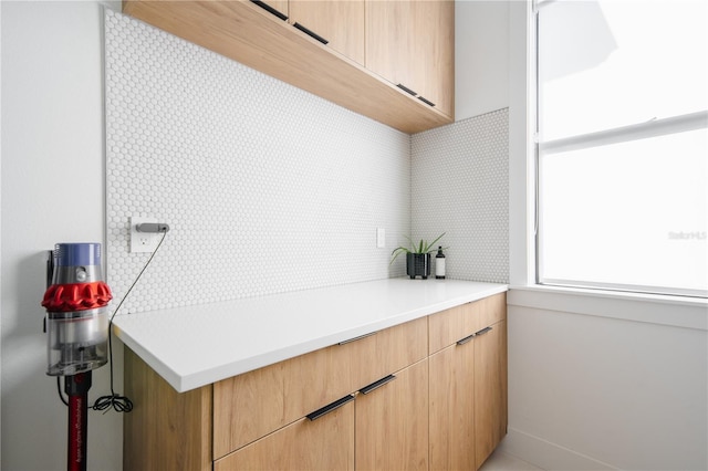 kitchen featuring light brown cabinets