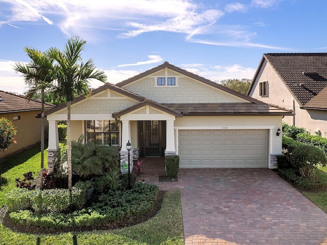 view of front of property featuring a garage