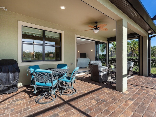 view of patio with ceiling fan