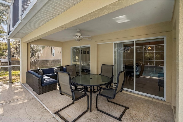 view of patio featuring outdoor lounge area and ceiling fan