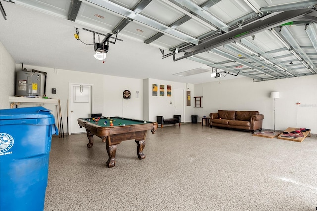 interior space featuring a garage door opener, electric panel, and water heater