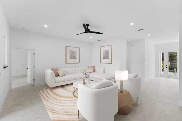 living room featuring ceiling fan