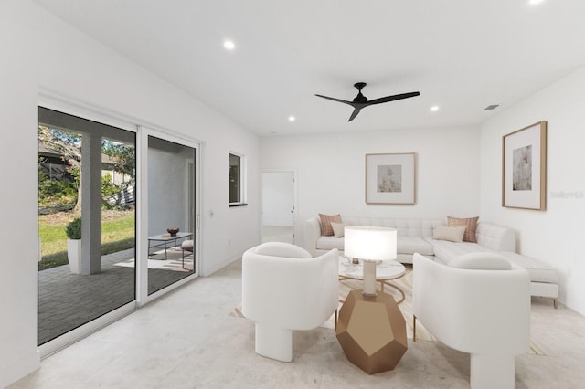 living room featuring ceiling fan