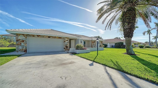 single story home with a front lawn and a garage