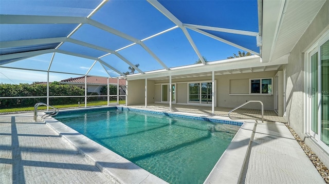 view of pool featuring a lanai and a patio area