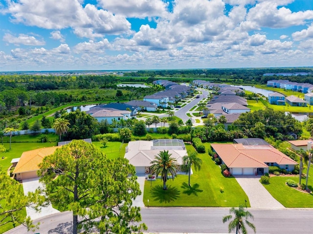 482 Rubens Dr E, Nokomis, FL 34275 - aerial perspective of suburban area with a large body of water