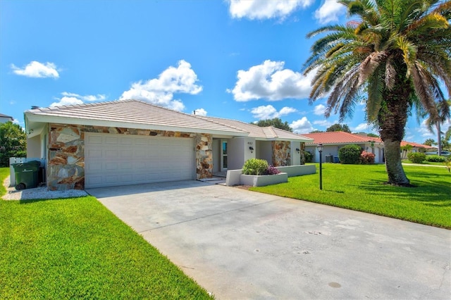 482 Rubens Dr E, Nokomis, FL 34275 - single story home with stone siding, a garage, concrete driveway, a front yard, and stucco siding