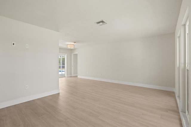 482 Rubens Dr E, Nokomis, FL 34275 - unfurnished room featuring light wood-type flooring
