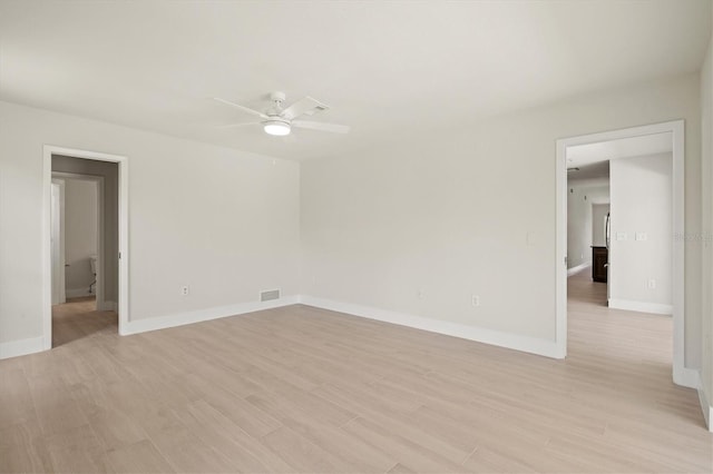 482 Rubens Dr E, Nokomis, FL 34275 - spare room with ceiling fan and light wood finished floors