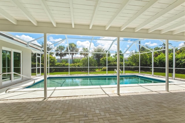 482 Rubens Dr E, Nokomis, FL 34275 - swimming pool with glass enclosure and a patio