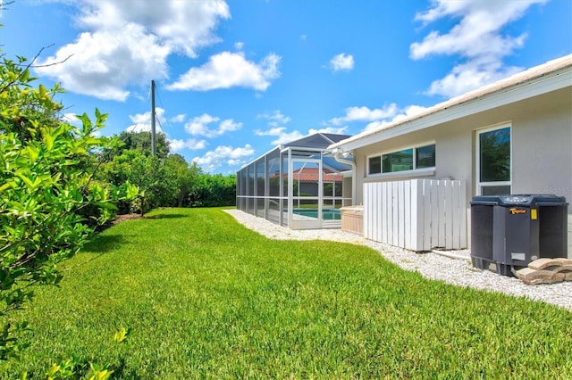 482 Rubens Dr E, Nokomis, FL 34275 - view of grassy yard with a pool and a lanai