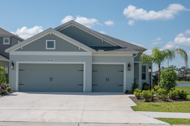 craftsman inspired home with a garage