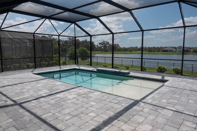 view of pool featuring a lanai, a patio area, and a water view