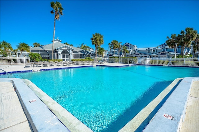 view of swimming pool featuring a patio area