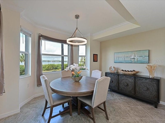 dining room featuring ornamental molding