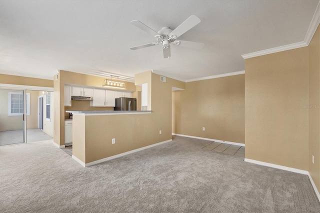 interior space with light carpet, ceiling fan, and ornamental molding