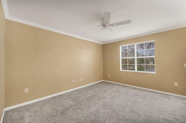 unfurnished room featuring carpet flooring, ceiling fan, and ornamental molding