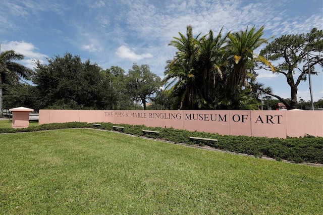 community sign with a lawn