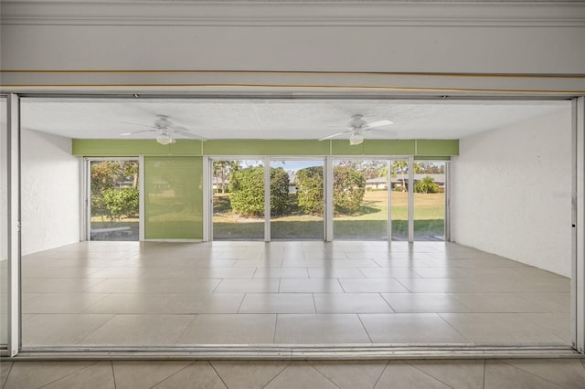 unfurnished sunroom with a healthy amount of sunlight