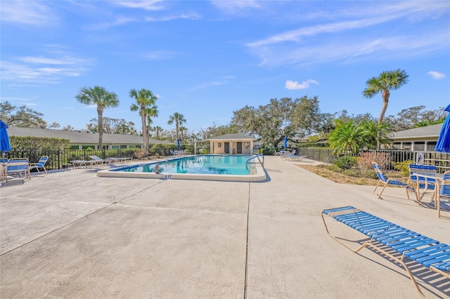 view of pool featuring a patio