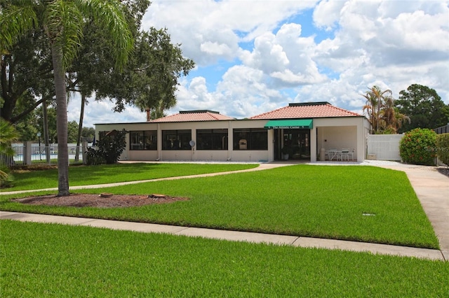 exterior space featuring a front lawn