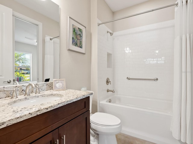 full bathroom with shower / bath combo with shower curtain, vanity, and toilet