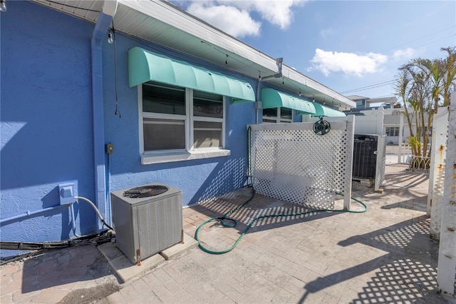 view of patio with cooling unit