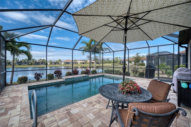 view of swimming pool featuring a lanai, a water view, and a patio