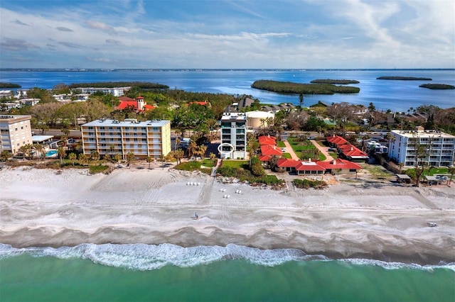 bird's eye view with a view of the beach and a water view