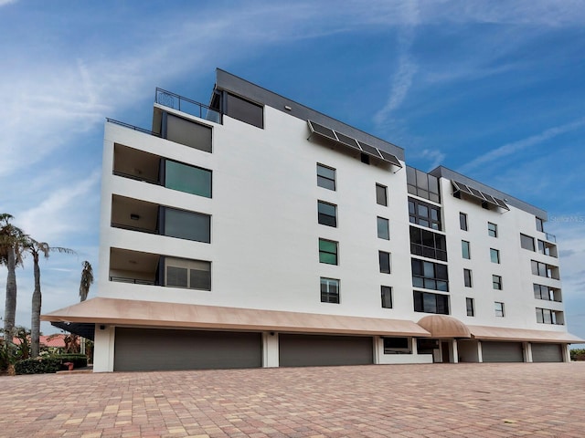 view of building exterior featuring a garage