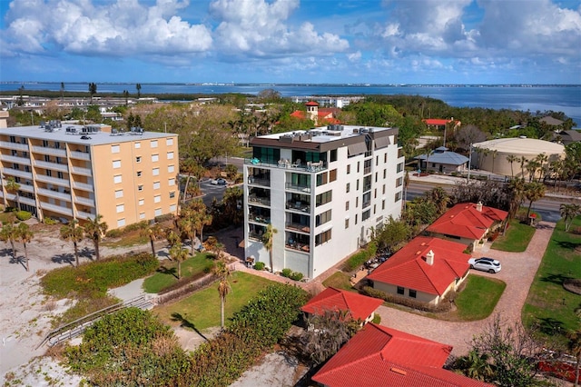 bird's eye view with a water view