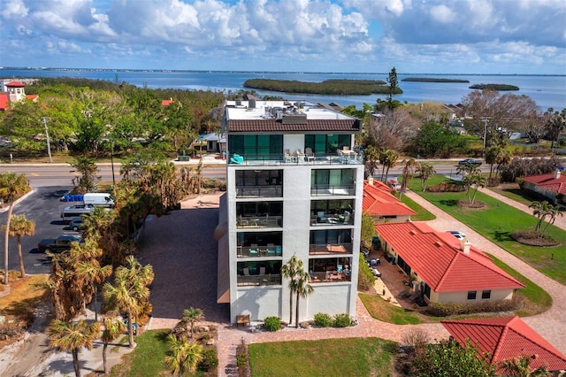 drone / aerial view with a water view