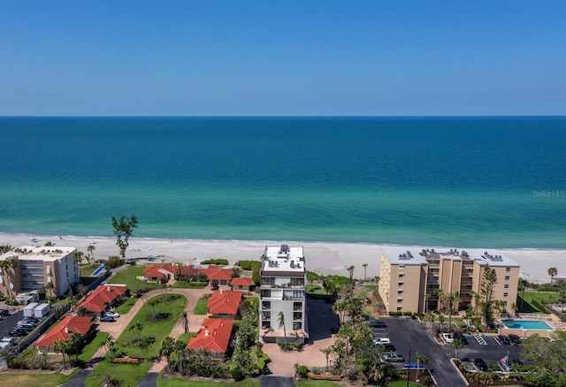 aerial view featuring a beach view and a water view